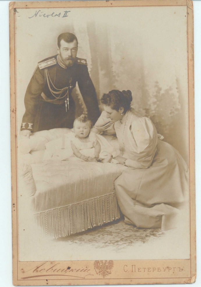 [NICHOLAS II — Superb unsigned Russian cabinet photo by Levitsky showing the young couple with their first baby, | Sophie Dupré Autographs