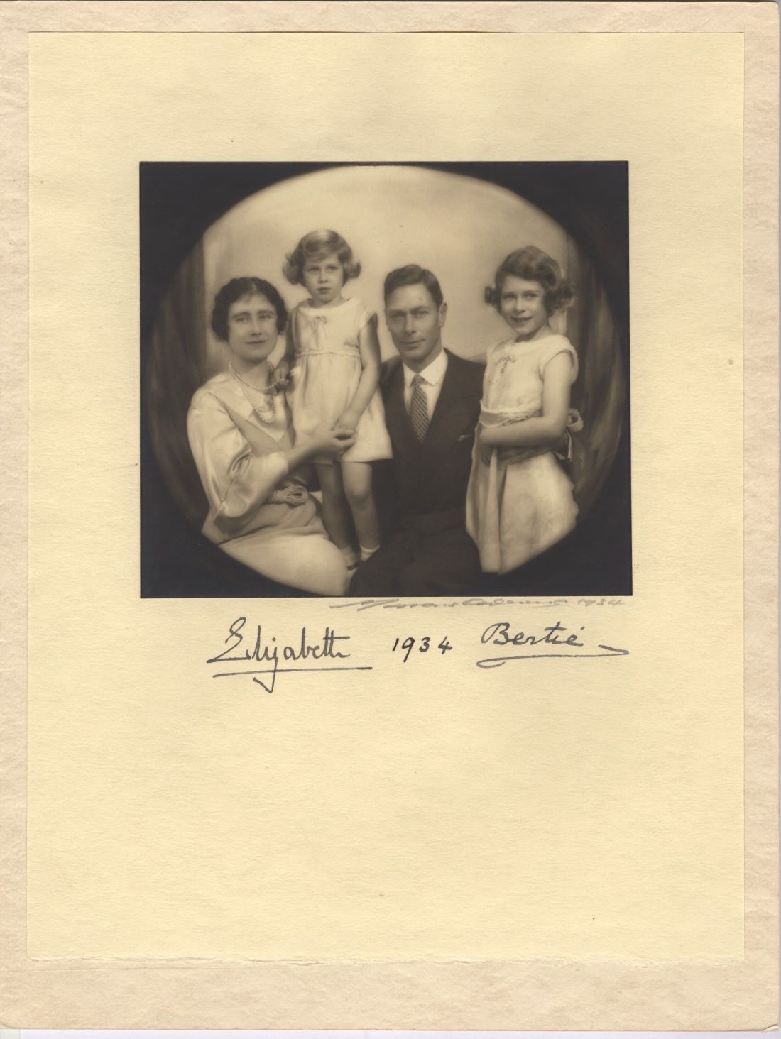 GEORGE VI — Lovely Christmas card signed by both - 'Elizabeth' & 'Bertie' also signed and dated in pencil by the photographer,  Marcus ADAMS , with a dated inscription by George opposite | Sophie Dupré Autographs