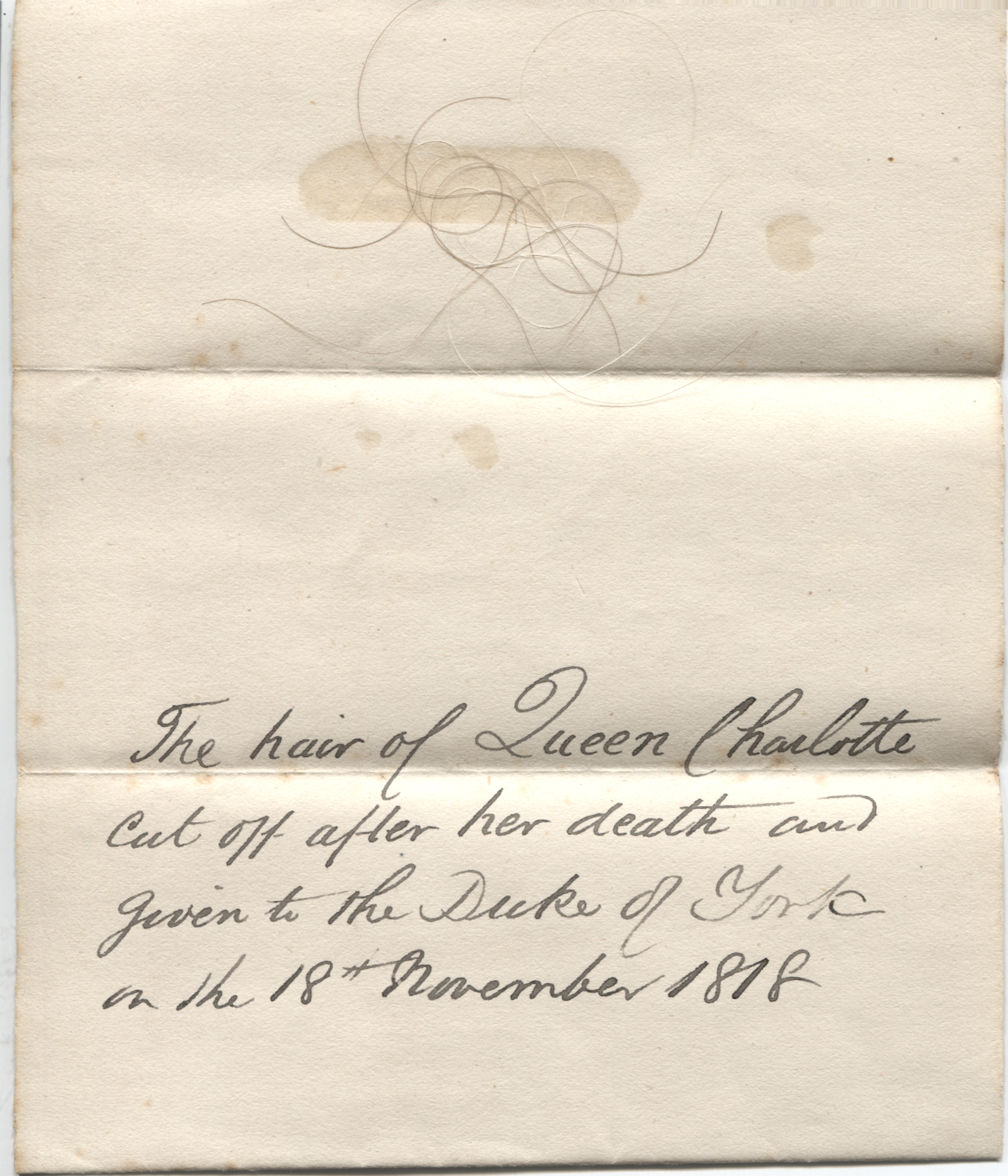 [CHARLOTTE SOPHIA — Several strands of hair attached to a piece of notepaper with a contemporary annotation | Sophie Dupré Autographs