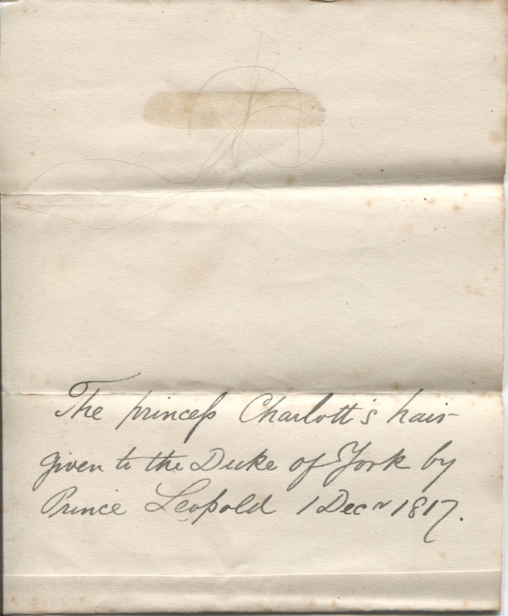 [CHARLOTTE AUGUSTA — Several strands of hair attached to a piece of notepaper with a contemporary annotation | Sophie Dupré Autographs